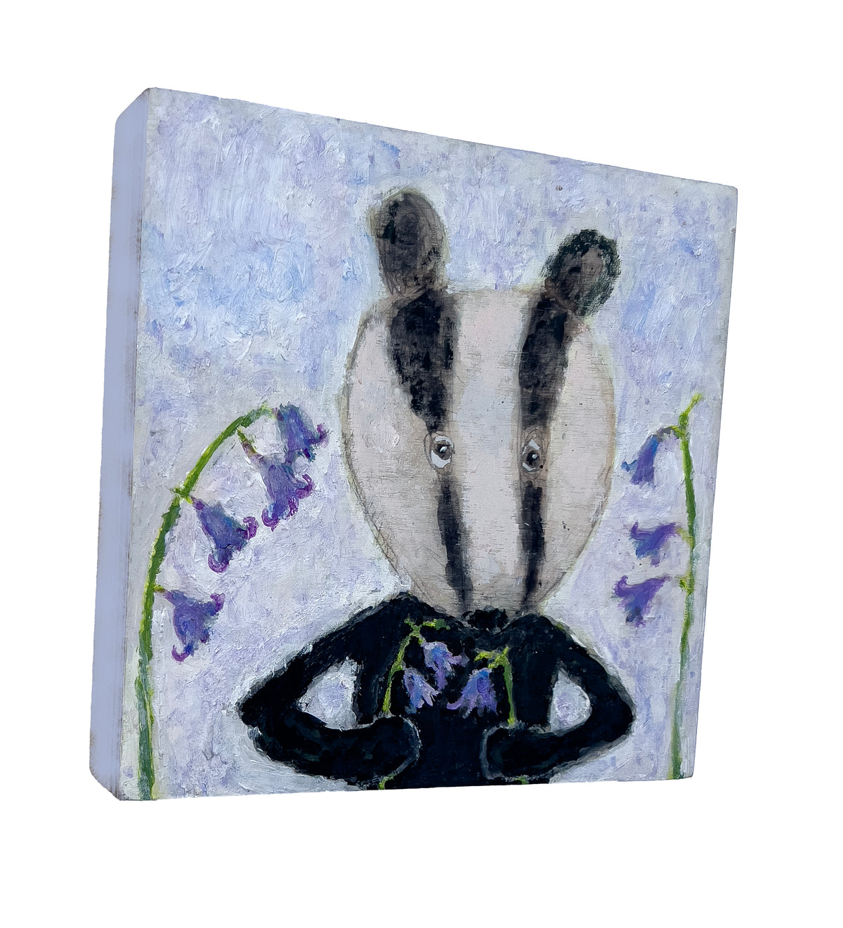 Naive style painting of badger holding bluebells by artist Zoe Attwood