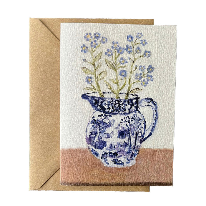 Pretty blue flowers all so individual in a Blue and White Ming Jug