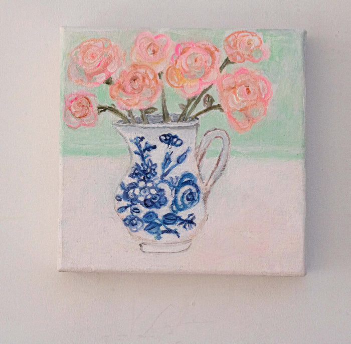 A painting of pink roses in a blue and white vintage jug against a light background by Zoe Attwood 